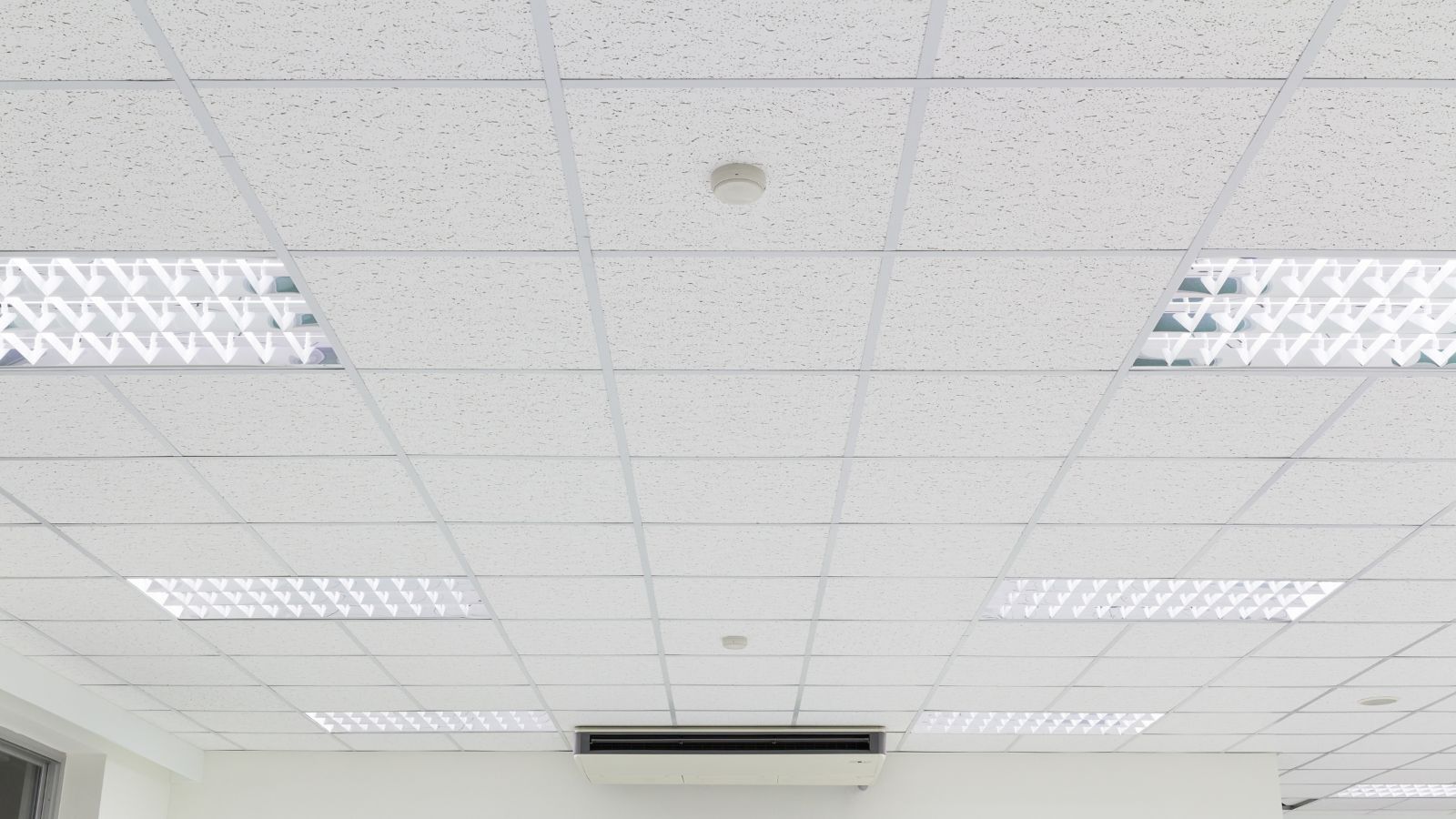 recessed lighting in a fresh drywall ceiling