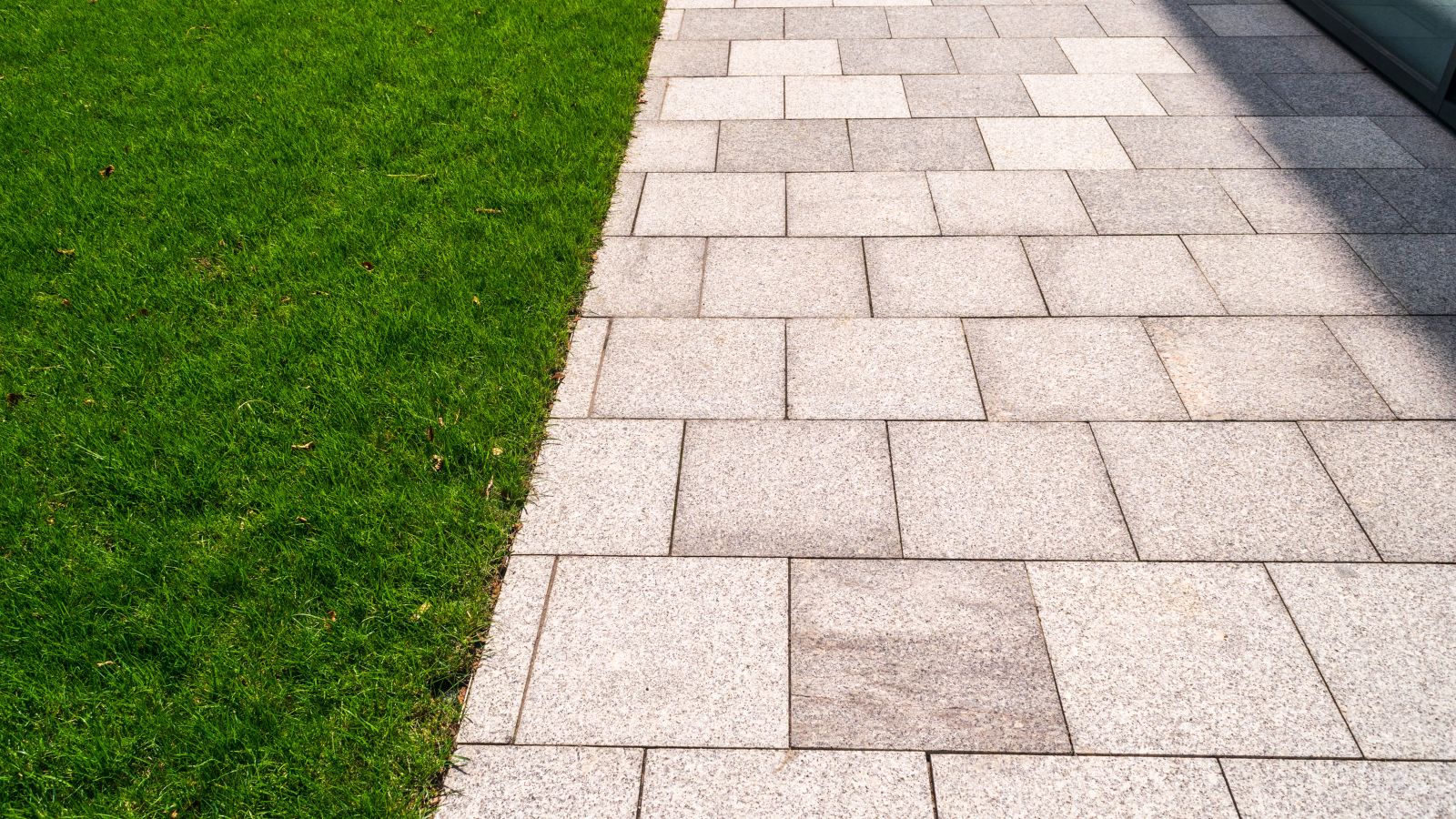 interlocking paver driveway with boundary wall